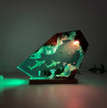 Decorative lamp with underwater scene inside a crystal-like structure